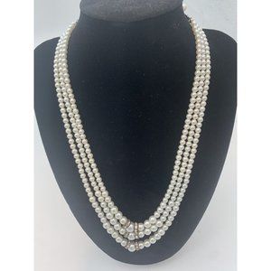 strand of vintage fauc pearls with diamond accents